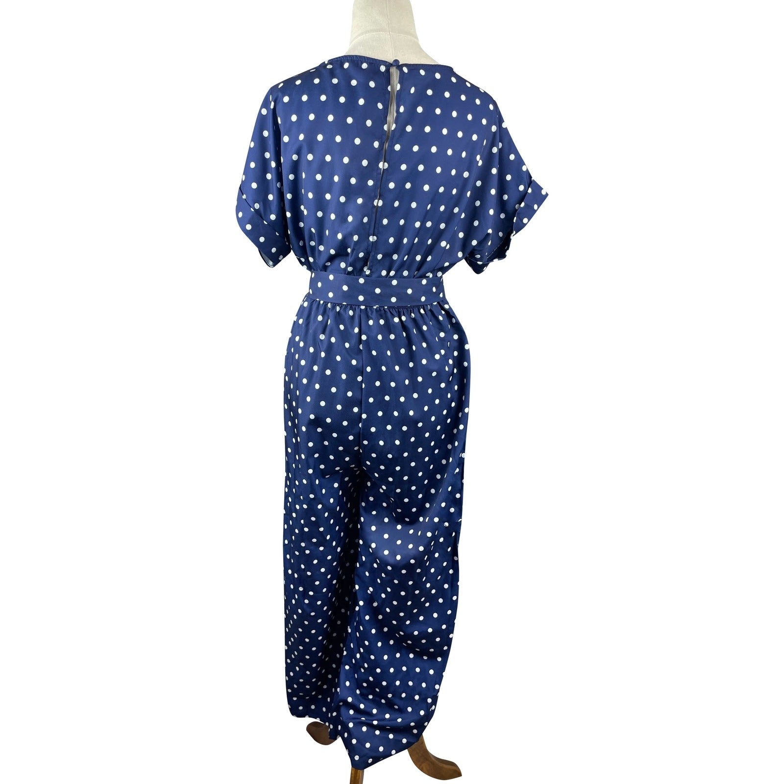 Unbranded navy jumpsuit w white polka dots | size 10-12